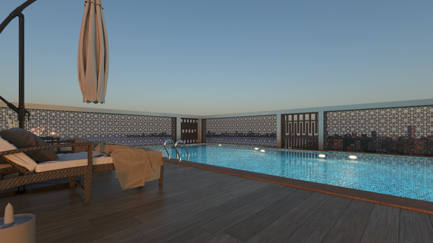 Rooftop swimming pool with loungers at dusk